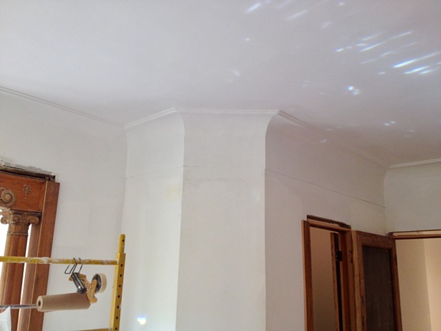 Swan neck cove moulding with re-created ceiling detail matched to existing