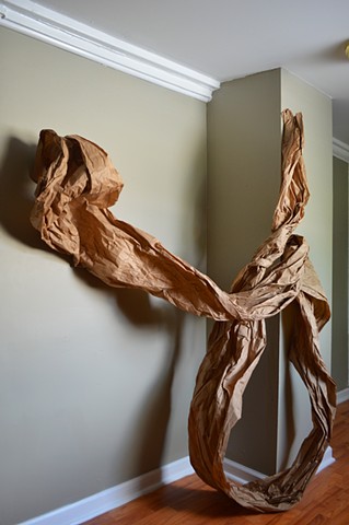 photograph of brown paper wall sculpture art studio by Robyn LeRoy-Evans