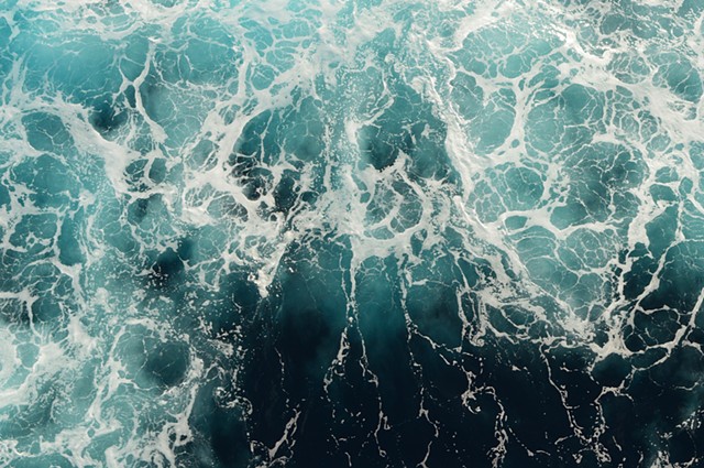 photograph of blue sea from above seafoam by Robyn LeRoy-Evans