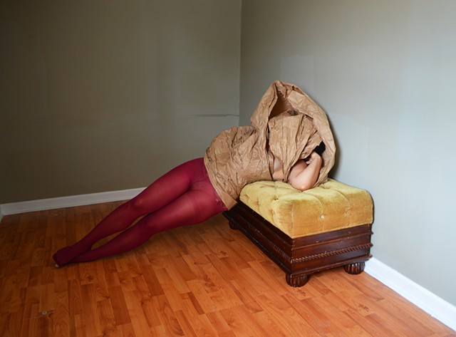 photograph of woman red tights brown paper studio by Robyn LeRoy-Evans