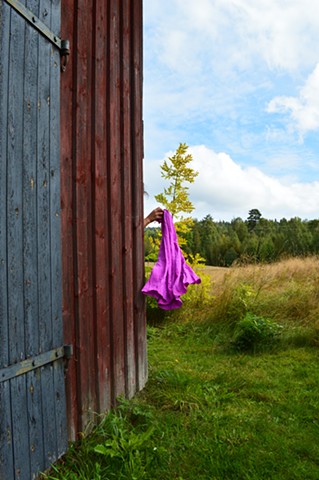 surreal photograph of woman purple fabric farm Sweden by Robyn LeRoy-Evans