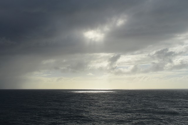 photograph of sea sky sun spotlight portal by Robyn LeRoy-Evans