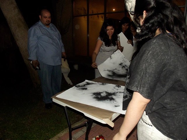 Students were invited to create their own drawings to contribute to the installation. 