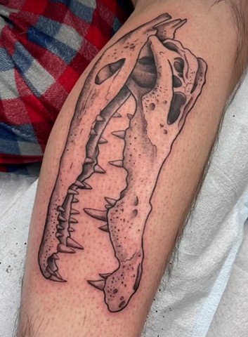 Crocodile skull tattoo strange world tattoo Calgary Alberta 