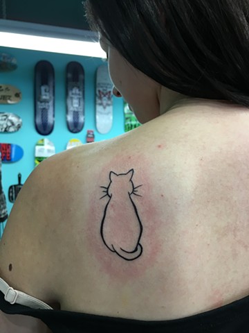 black line work cat tattoo 