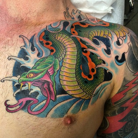 Tattoo of snake and water 