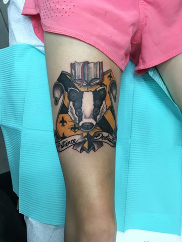 animal crest tattoo