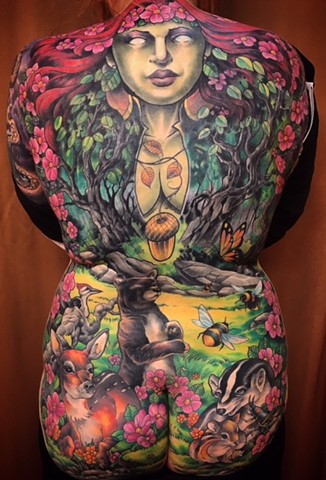 Cover up back piece tattoo by artist Brett Schwindt of Strange World Tattoo in Calgary