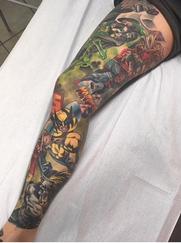 comic book leg sleeve tattoo by artist Brett Schwindt of Strange World Tattoo in Calgary