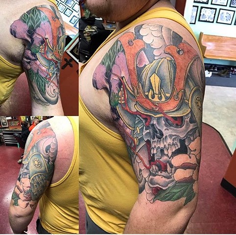 Japanese half sleeve tattoo in bold colour Strange World Tattoo Calgary 