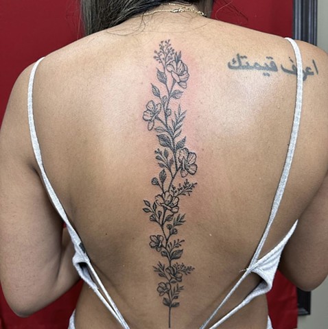 Fineline floral flowers dainty girly feminine strange world tattoo Calgary alberta Canada tattoo ideas