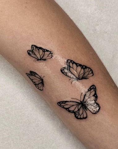 butterflies tattoo Strange World Tattoo Calgary Alberta Canada