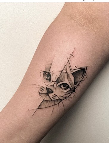 cat tattoo with a geometric accent tattoo Strange World Tattoo Calgary Alberta Canada