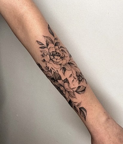 floral forearm wrap tattoo Calgary tattoo Strange World Tattoo 