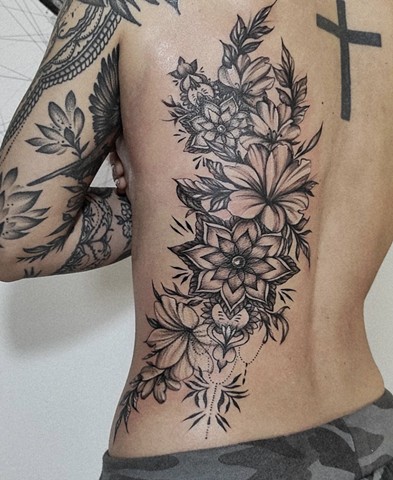 flowers with Mandala design backpiece in black and grey Calgary Tattoos Strange World Tattoo