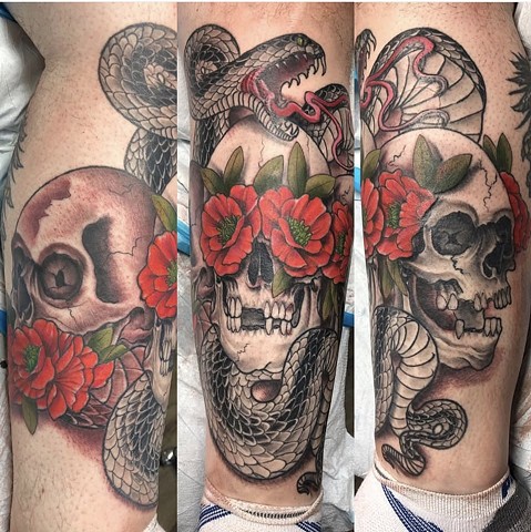 Snake tattoo skull tattoo flower tattoo strange world tattoo Calgary 