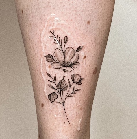 flower design tattoo Strange World Tattoo Calgary Alberta Canada