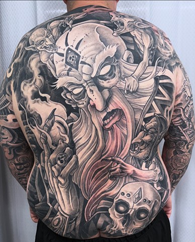 Calgarys best tattoo artist Brett Schwindt Calgary tattoos strange world tattoo black and grey backpiece Viking theme tattoo yyc tattoo