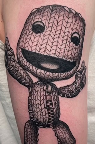 Sackboy LittleBigPlanet video game tattoos Strange World Tattoo Calgary Alberta 