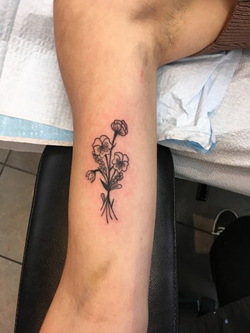 black and grey flower tattoo Calgary