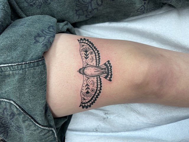 Bird with Floral Designs on thigh