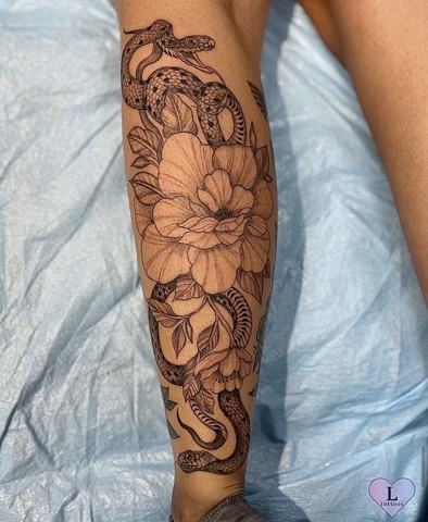 Snakes with florals on lower leg
