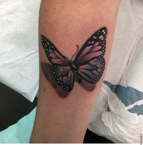 Butterfly tattoo Calgary Strange World Tattoo calgary