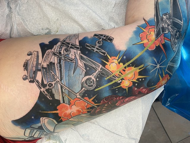 Starwars spaceship full colour battle nerd tattoos Brett Schwindt strange world tattoo Calgary alberta Canada yyc