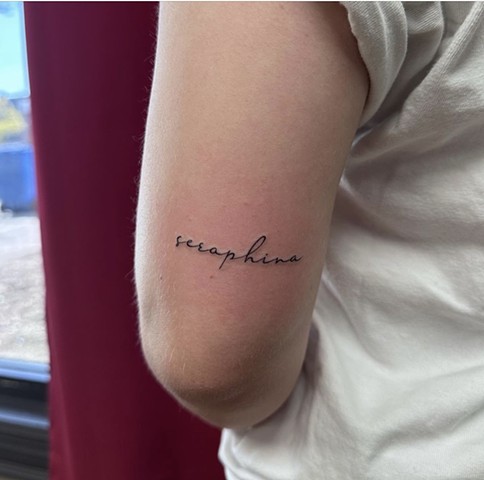 Script tattoo below elbow Calgary alberta Canada tattoos shop artist fineline dainty script girly feminine