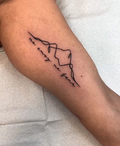 Single line mountain with script