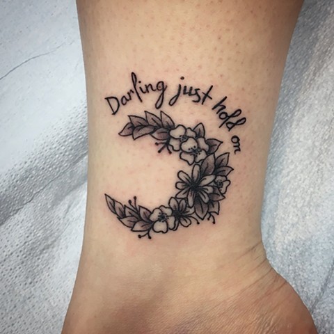 lettering, moon and flower tattoo 