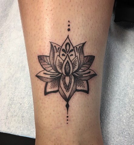 black and grey lotus flower tattoo by Kristin of Strange World Tattoo 