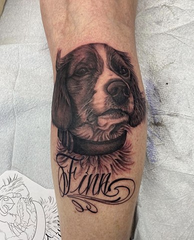 Dog portrait black and grey portrait tattoo strange world tattoo Calgary 
