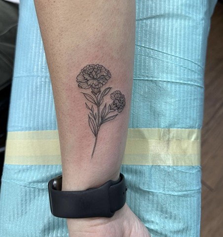 Carnation on wrist Calgary alberta tattoo florals feminine fineline girly dainty tattoo artist shop