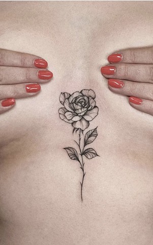 Sternum flower tattoo Calgary Tattoos Strange World Tattoo