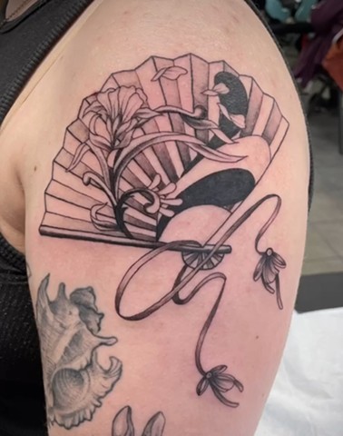 FLASH designs fan tattoo strange world tattoo Calgary Alberta 