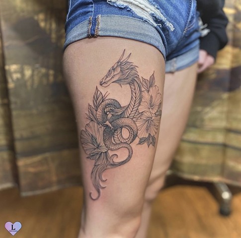 Dragon with florals on thigh