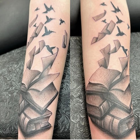 Book tattoo bird tattoo black and grey tattoo strange world tattoo Calgary 