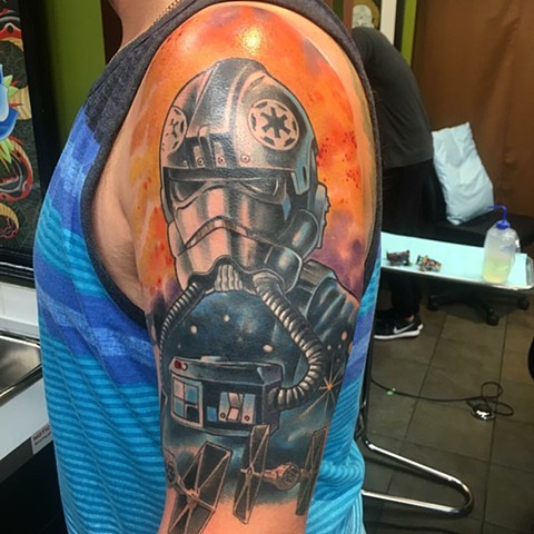 Star Wars pilot and ships half sleeve by the artist Brett Schwindt of Strange World Tattoo in Calgary, Ab, Canada