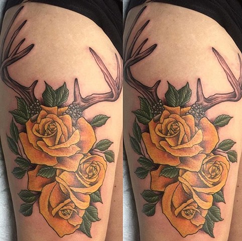 Roses and antler tattoo on upper thigh Strange World Tattoo Calgary, Alberta, Canada