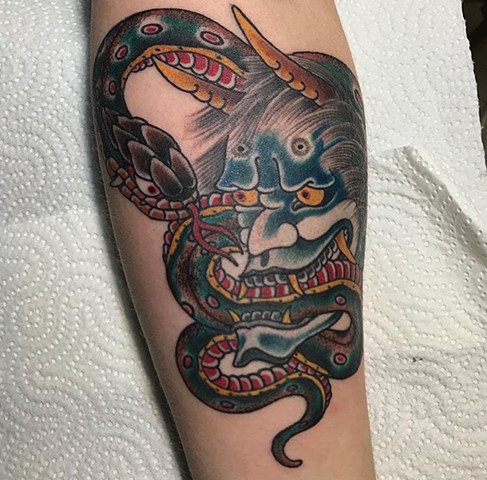 Japanese snake tattoo Calgary Alberta strange World tattoo 