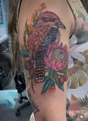 bird tattoo with flowers Strange World Tattoo Calgary, Alberta Canada