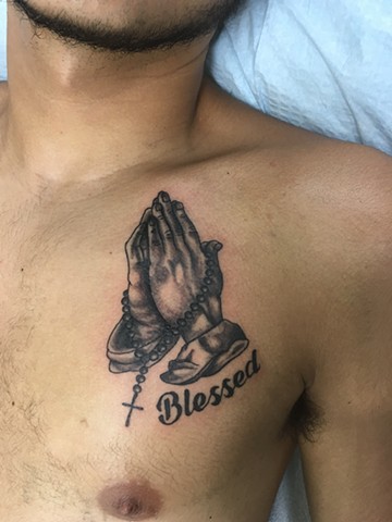 praying hands tattoo