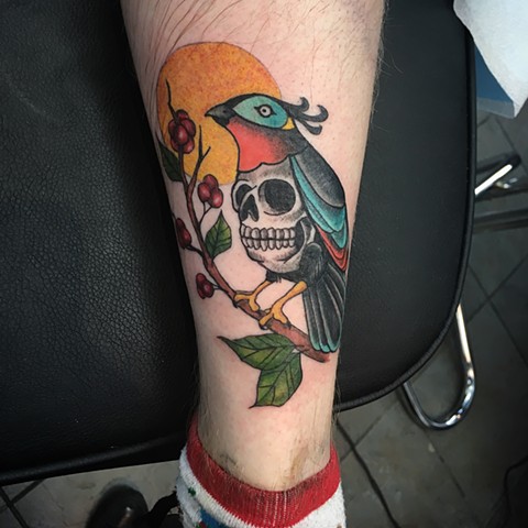 skull bird sitting on a branch tattoo by Kristin of Strange World Tatttoo in Calgary, Alberta 