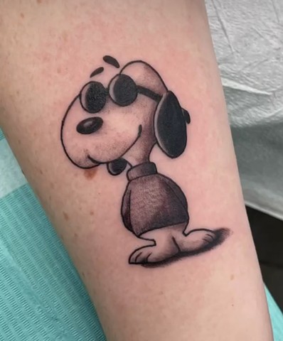 Cute snoopy tattoo project strange world tattoo Calgary 