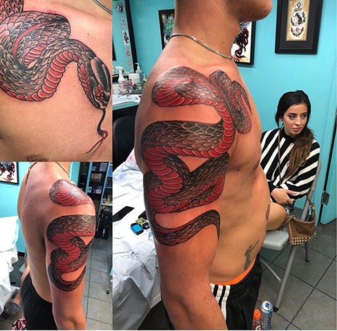 Snake shoulder tattoo Strange World Tattoo Calgary 