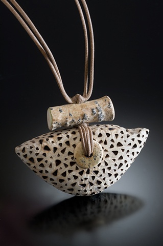 Driftwood pendant with cottonwood and bone bead.