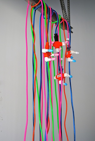 This sculpture is made of electric power cords, adapters, cable ties and light bulbs. New York NY. School of Visual Arts. Skowhegan School of Painting and Sculpture. Mary Carter Taub is an installation artist based in Chapel Hill, NC. 