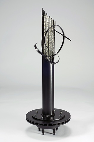 This work is categorized as Assemblage, Found and Fabricated or Junk sculpture by artist, Milt Friedly.