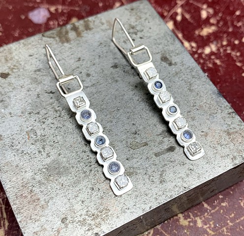 Earrings: Sterling silver, moissanite, sapphire 